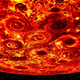 Jupiter’s south pole as seen at 5 µm wavelength, showing heat emanating from the planet through the clouds (the darker the color, the thicker the clouds).